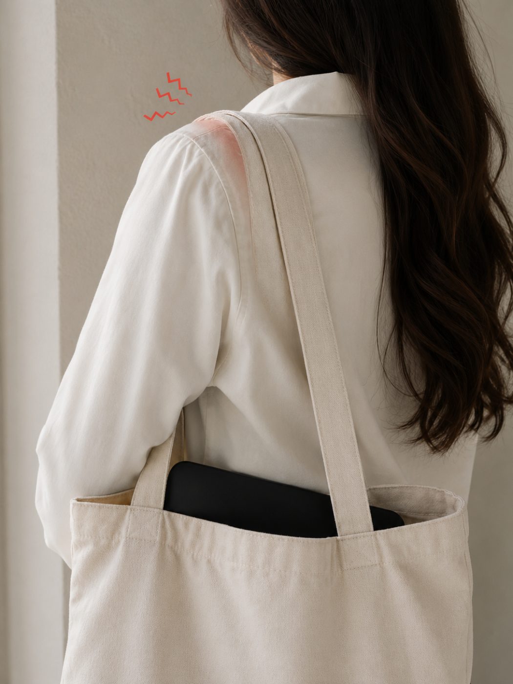 A thin strap digging into the shoulder